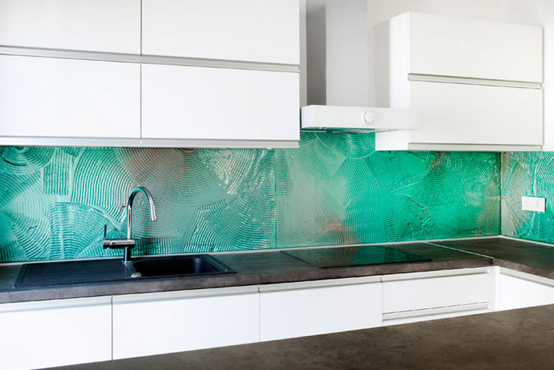 Kitchen elements and glass wall backsplash, textured glass.