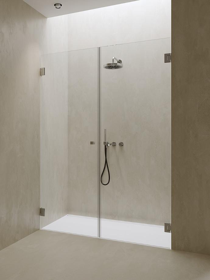 Shower cabin in a niche with double pivot doors.