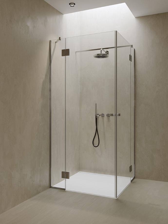 Corner shower cabin with double glass doors and fixed glasses.