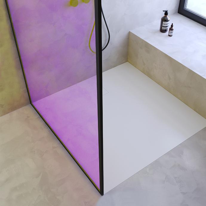 Top view of a modernly designed bathroom with a glass partition.