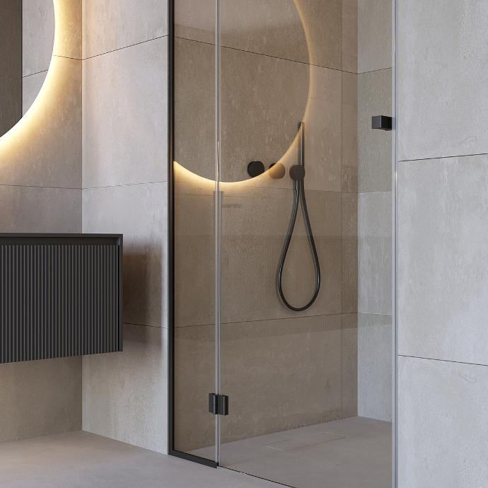 Detail of the glass doors of the shower cabin with a cabinet and mirror.