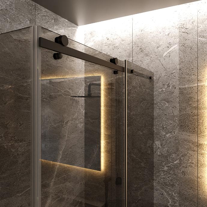 Detail of the glass shower door with guides and walls with stone cladding.