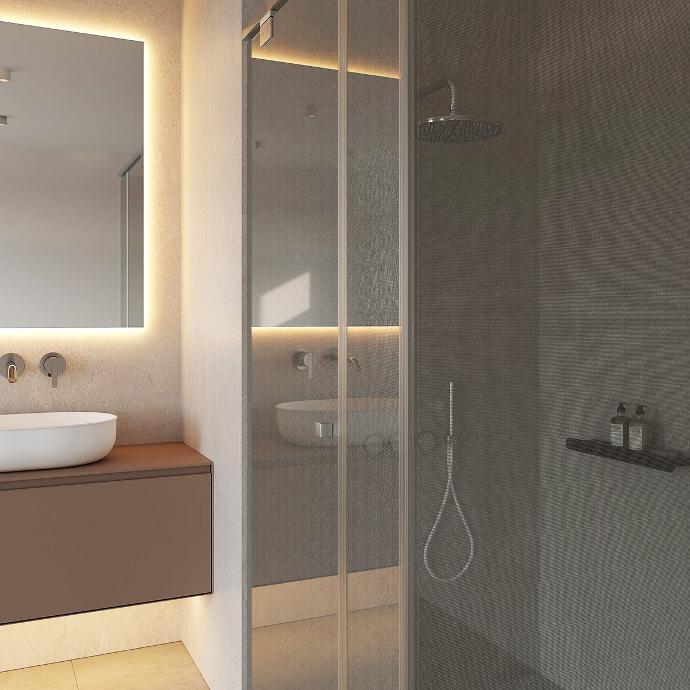 Detail of the glass doors of the shower cabin with a cabinet and mirror.